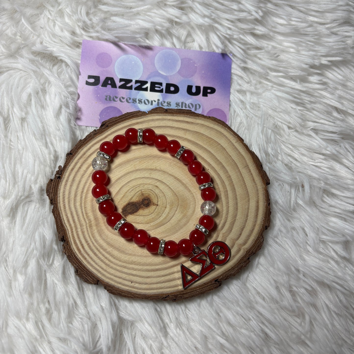 delta charm bracelet