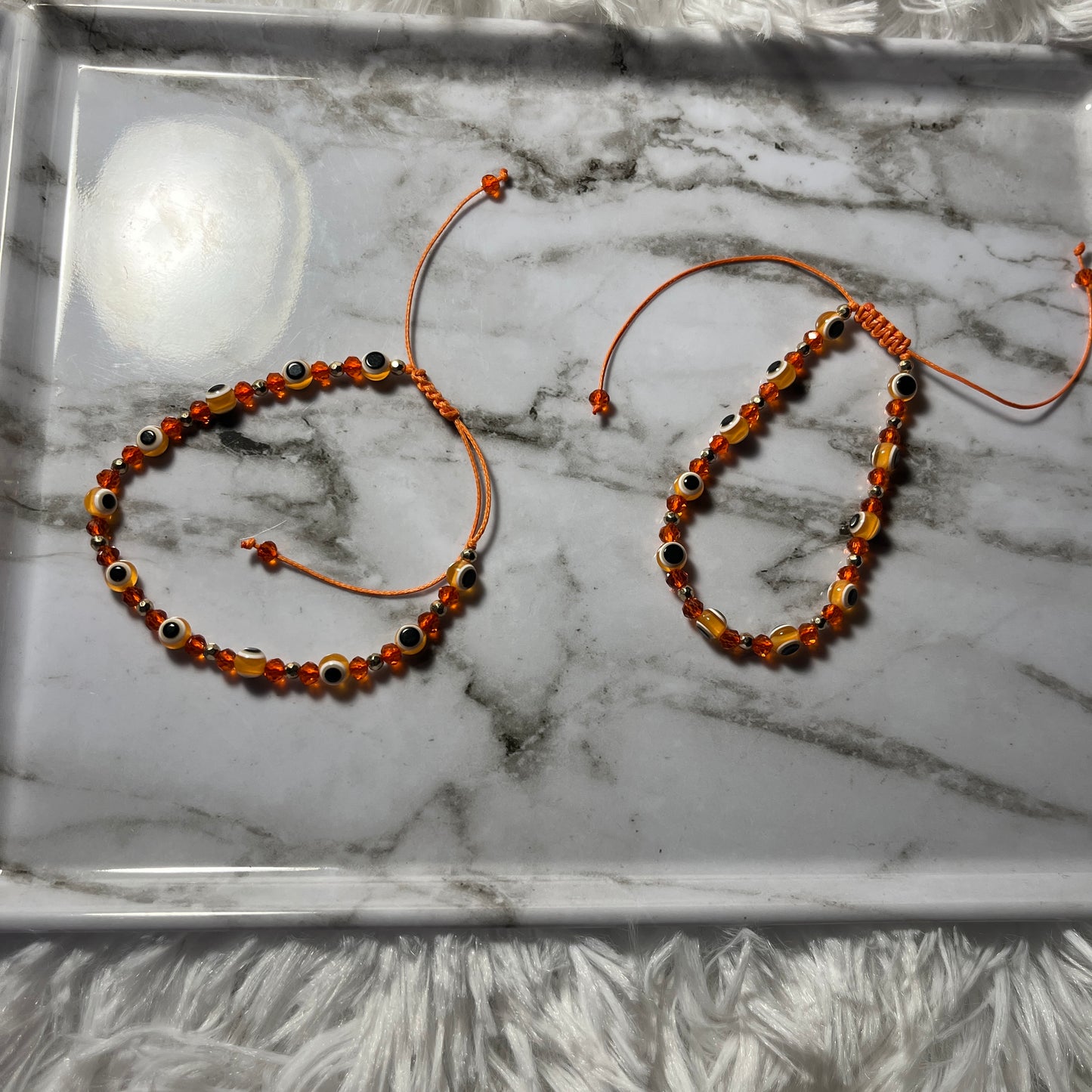 orange evil eye adjustable