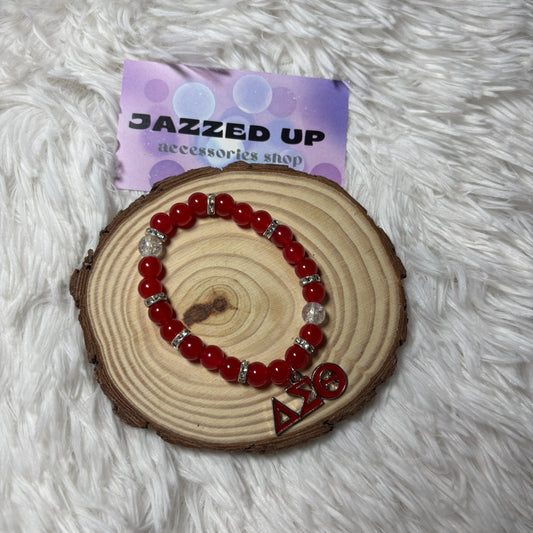 delta charm bracelet